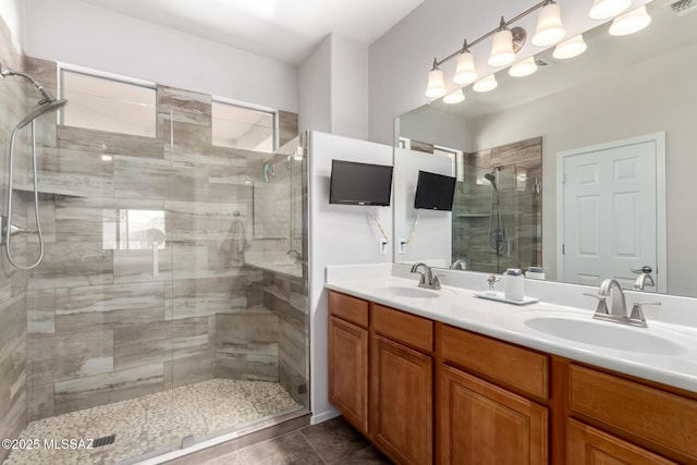 2257 E Skipping Rock Way, Tucson, AZ 85737 - full bathroom featuring a stall shower, double vanity, and tile patterned flooring