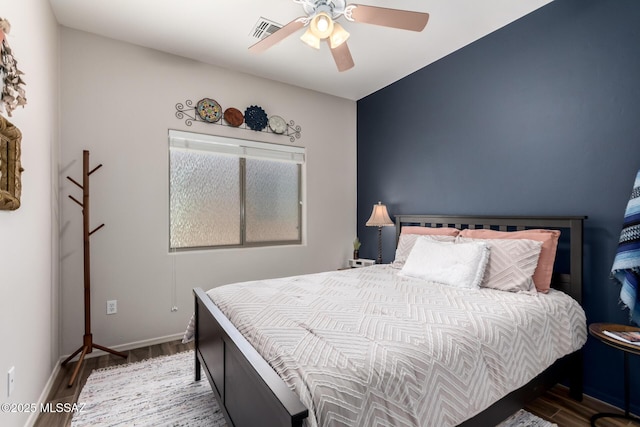 2257 E Skipping Rock Way, Tucson, AZ 85737 - bedroom featuring wood finished floors and a ceiling fan
