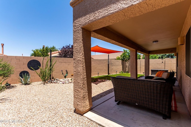 2257 E Skipping Rock Way, Tucson, AZ 85737 - fenced backyard featuring a patio area and an outdoor hangout area