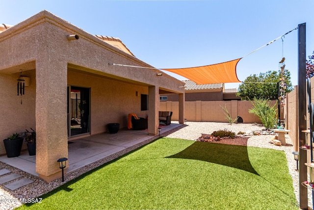 2257 E Skipping Rock Way, Tucson, AZ 85737 - fenced backyard with a patio area