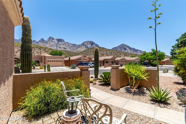 2257 E Skipping Rock Way, Tucson, AZ 85737 - view of patio / terrace with a mountain view and a residential view