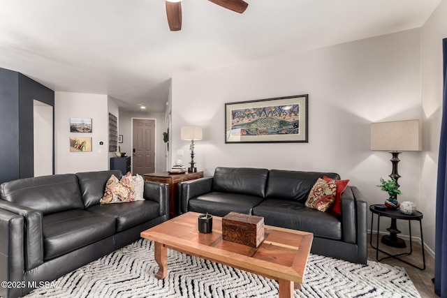 2257 E Skipping Rock Way, Tucson, AZ 85737 - living area with ceiling fan and baseboards