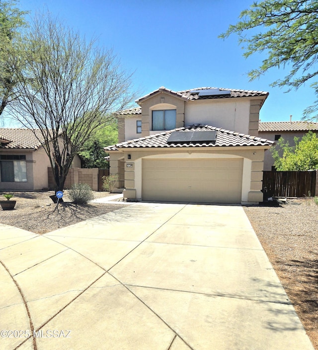 4295 W Banner Mine Pl, Tucson, AZ 85745 - mediterranean / spanish-style home featuring solar panels, stucco siding, driveway, a tiled roof, and a garage