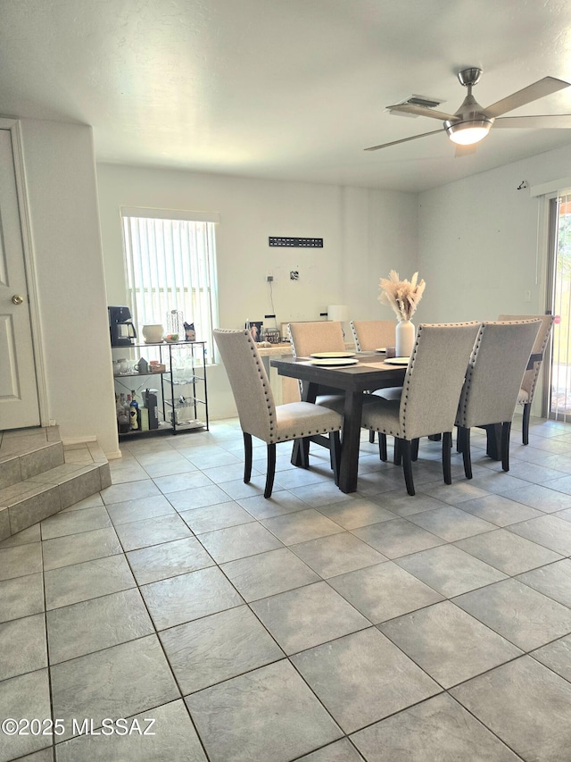 4295 W Banner Mine Pl, Tucson, AZ 85745 - dining area with ceiling fan and light tile patterned floors