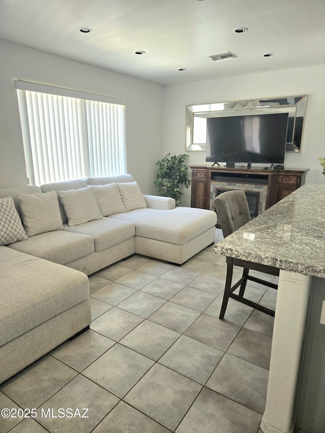4295 W Banner Mine Pl, Tucson, AZ 85745 - living room with light tile patterned floors and recessed lighting