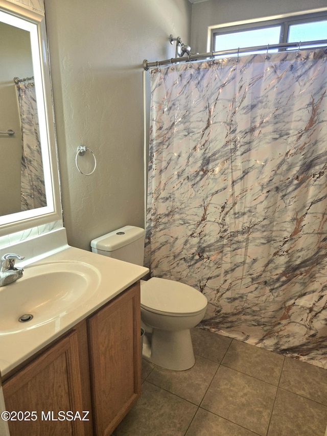 4295 W Banner Mine Pl, Tucson, AZ 85745 - full bathroom featuring vanity, tile patterned floors, and curtained shower