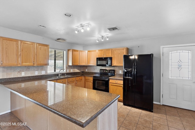 807 N Manzanita Pl, Saint David, AZ 85630 - kitchen with black appliances, a peninsula, tasteful backsplash, and light brown cabinets