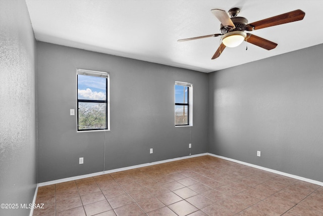 807 N Manzanita Pl, Saint David, AZ 85630 - spare room featuring tile patterned floors and ceiling fan
