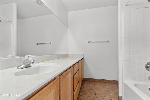 807 N Manzanita Pl, Saint David, AZ 85630 - bathroom featuring vanity, tile patterned flooring, and  shower combination