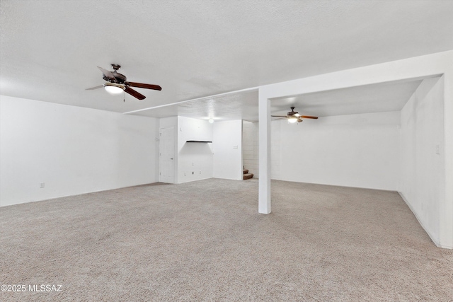 807 N Manzanita Pl, Saint David, AZ 85630 - unfurnished living room with a ceiling fan and carpet flooring