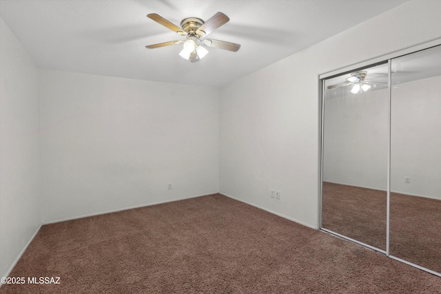 807 N Manzanita Pl, Saint David, AZ 85630 - unfurnished bedroom with carpet flooring, a closet, and ceiling fan