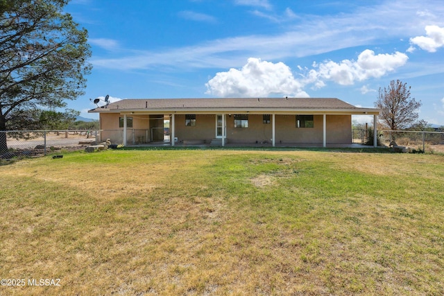 807 N Manzanita Pl, Saint David, AZ 85630 - back of property with a patio area and stucco siding