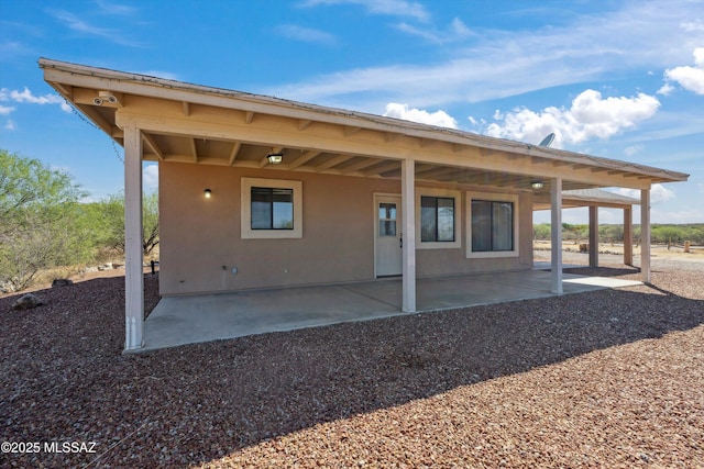 807 N Manzanita Pl, Saint David, AZ 85630 - rear view of property featuring a patio area and stucco siding