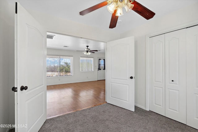 807 N Manzanita Pl, Saint David, AZ 85630 - unfurnished bedroom featuring carpet floors, a closet, and ceiling fan