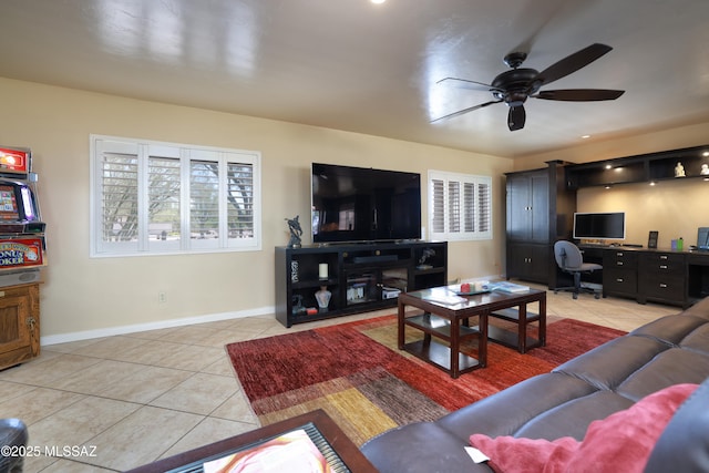8142 N Modena Dr, Tucson, AZ 85742 - living area featuring light tile patterned floors, ceiling fan, and an office area