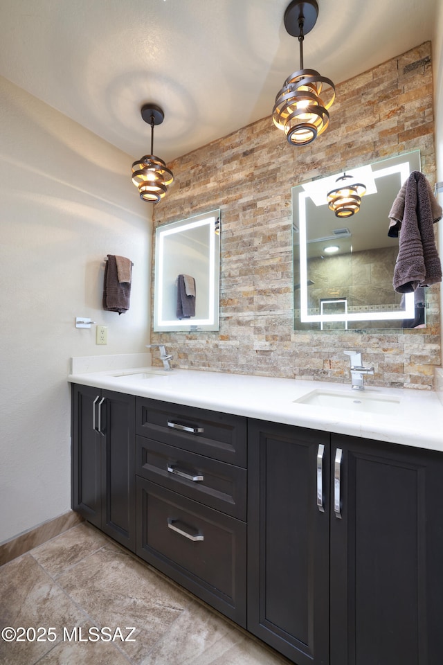 8142 N Modena Dr, Tucson, AZ 85742 - bathroom with double vanity and decorative backsplash
