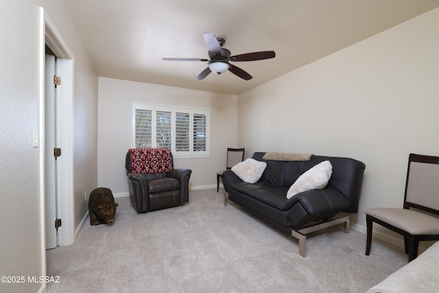 8142 N Modena Dr, Tucson, AZ 85742 - carpeted living area featuring ceiling fan and baseboards