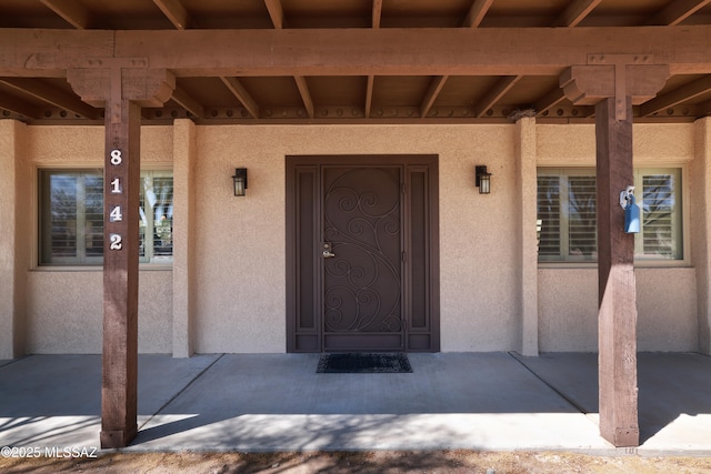 8142 N Modena Dr, Tucson, AZ 85742 - property entrance with stucco siding