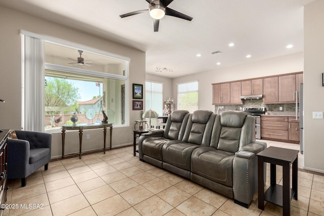 938 E Grass Meadow Pl, Oro Valley, AZ 85755 - living area featuring a ceiling fan, light tile patterned flooring, and recessed lighting