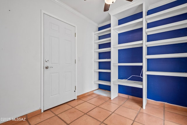 5015 N Via Condesa, Tucson, AZ 85718 - unfurnished bedroom with ornamental molding, tile patterned flooring, and ceiling fan