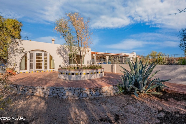 5015 N Via Condesa, Tucson, AZ 85718 - rear view of property featuring stucco siding and french doors