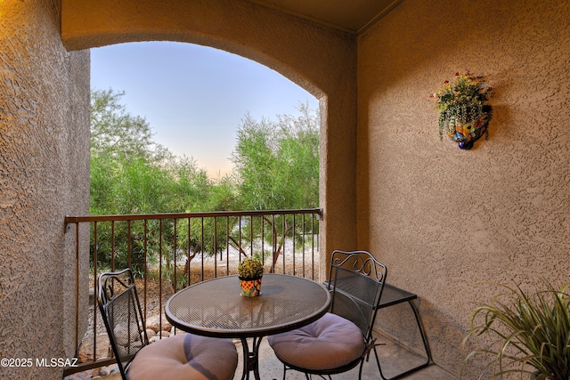 1500 E Pusch Wilderness Dr Unit 2103, Tucson, AZ 85737 - view of balcony at dusk