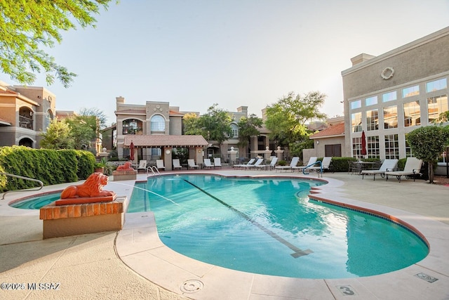 1500 E Pusch Wilderness Dr Unit 2103, Tucson, AZ 85737 - community pool with a patio