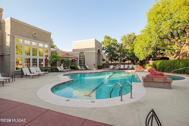1500 E Pusch Wilderness Dr Unit 2103, Tucson, AZ 85737 - community pool featuring a patio