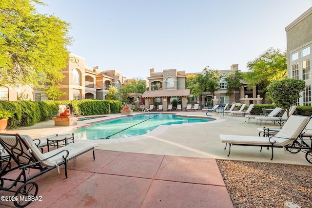 1500 E Pusch Wilderness Dr Unit 2103, Tucson, AZ 85737 - community pool featuring a patio area