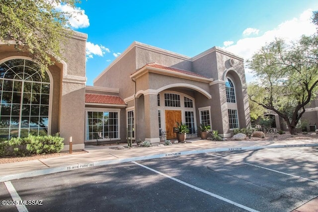 1500 E Pusch Wilderness Dr Unit 2103, Tucson, AZ 85737 - view of property featuring uncovered parking