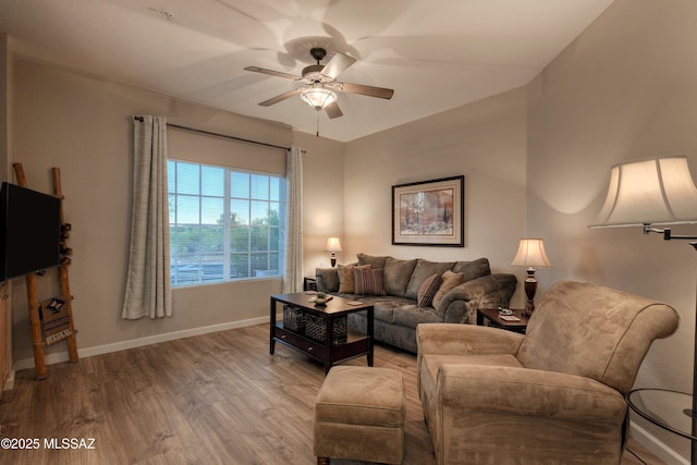 1500 E Pusch Wilderness Dr Unit 2103, Tucson, AZ 85737 - living room featuring ceiling fan and wood finished floors