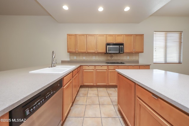 14085 E Copper Mesa Ct, Vail, AZ 85641 - kitchen featuring appliances with stainless steel finishes, tasteful backsplash, light countertops, light tile patterned floors, and recessed lighting