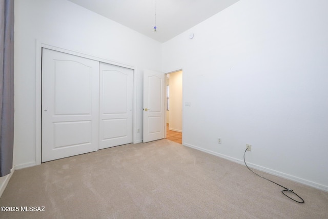 14085 E Copper Mesa Ct, Vail, AZ 85641 - unfurnished bedroom featuring carpet flooring and a closet