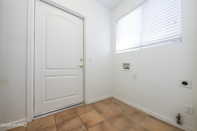 14085 E Copper Mesa Ct, Vail, AZ 85641 - washroom with hookup for a washing machine, hookup for an electric dryer, tile patterned floors, and hookup for a gas dryer