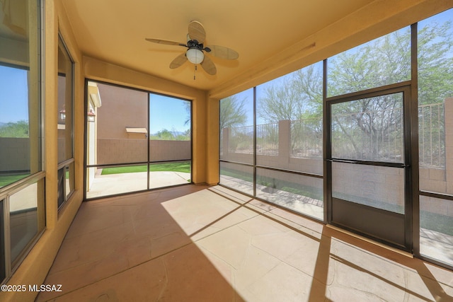 14085 E Copper Mesa Ct, Vail, AZ 85641 - unfurnished sunroom with a ceiling fan