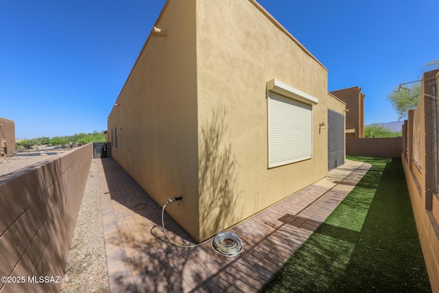 14085 E Copper Mesa Ct, Vail, AZ 85641 - view of side of property featuring a fenced backyard and stucco siding
