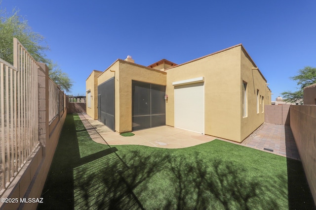 14085 E Copper Mesa Ct, Vail, AZ 85641 - rear view of property with stucco siding, a patio area, and a fenced backyard