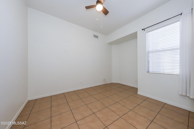 14085 E Copper Mesa Ct, Vail, AZ 85641 - empty room with ceiling fan and light tile patterned floors
