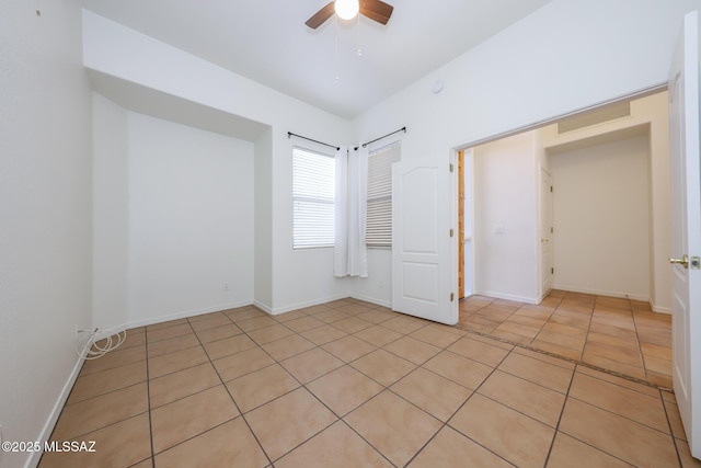 14085 E Copper Mesa Ct, Vail, AZ 85641 - unfurnished bedroom with light tile patterned flooring and a ceiling fan