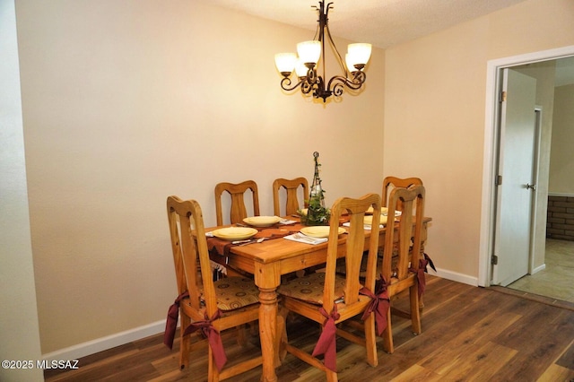 326 N Sage St, Pearce, AZ 85625 - dining space with wood finished floors and a chandelier