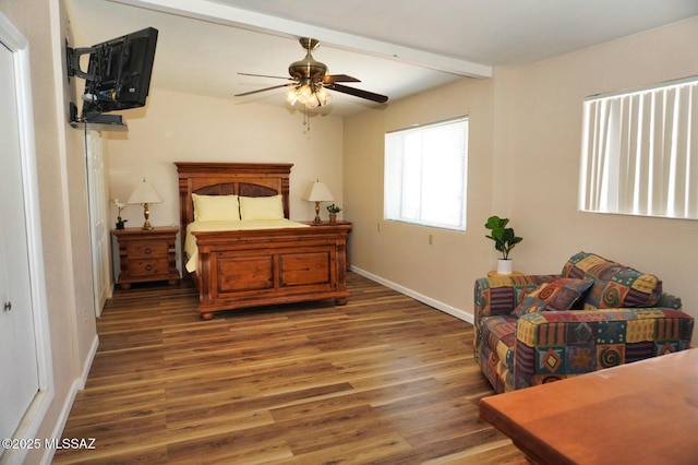 326 N Sage St, Pearce, AZ 85625 - bedroom featuring wood finished floors, beamed ceiling, and ceiling fan