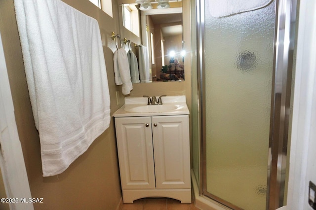 326 N Sage St, Pearce, AZ 85625 - bathroom featuring a stall shower, vanity, and tile patterned flooring