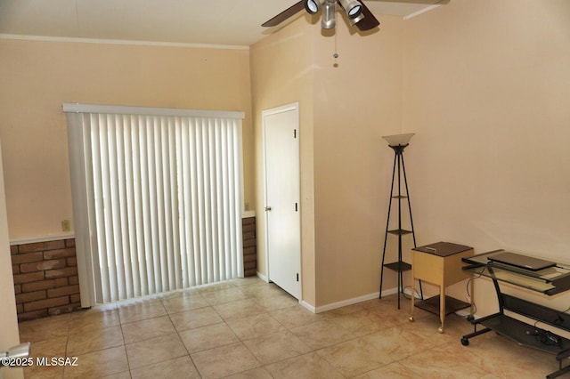 326 N Sage St, Pearce, AZ 85625 - empty room featuring ceiling fan, tile patterned floors, and crown molding