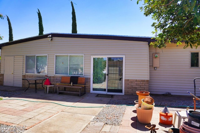 326 N Sage St, Pearce, AZ 85625 - rear view of property featuring a patio