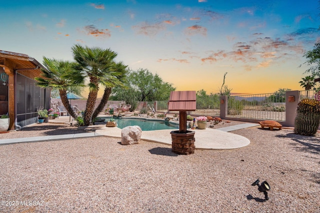 14092 E Placita Mochuelo, Vail, AZ 85641 - pool at dusk featuring a patio area