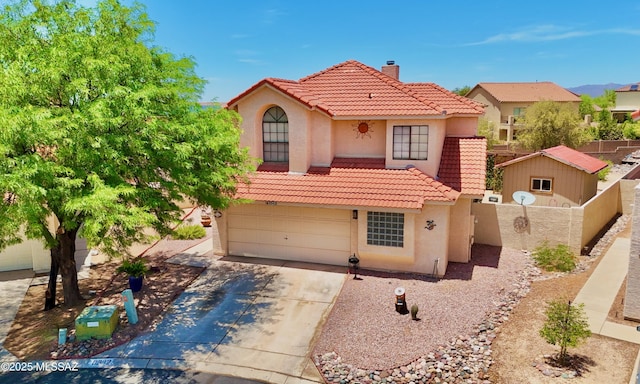 8942 N Ferber Ct, Tucson, AZ 85742 - mediterranean / spanish house with a tile roof, stucco siding, a chimney, concrete driveway, and a garage