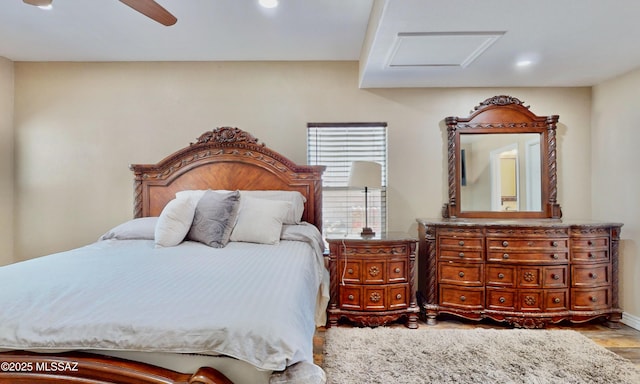 8942 N Ferber Ct, Tucson, AZ 85742 - bedroom featuring attic access, wood finished floors, recessed lighting, and a ceiling fan