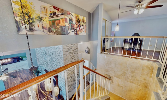 8942 N Ferber Ct, Tucson, AZ 85742 - stairway featuring a ceiling fan