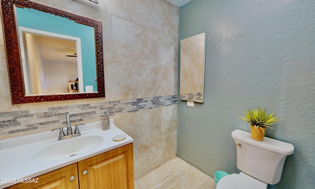 8942 N Ferber Ct, Tucson, AZ 85742 - bathroom featuring vanity, backsplash, and tile patterned flooring