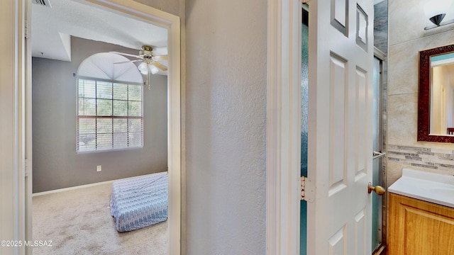 8942 N Ferber Ct, Tucson, AZ 85742 - bathroom featuring vanity and a ceiling fan